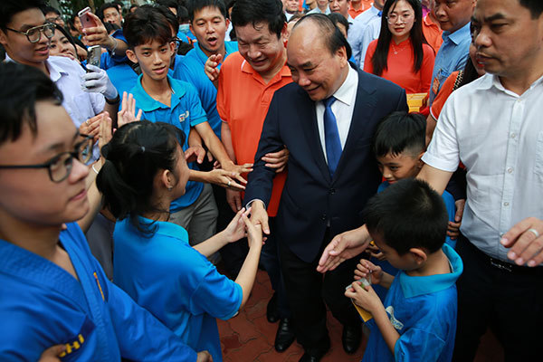 Chủ tịch nước Nguyễn Xuân Phúc dự ngày hội tới trường của 200 em học sinh đầu tiên trường Hope School